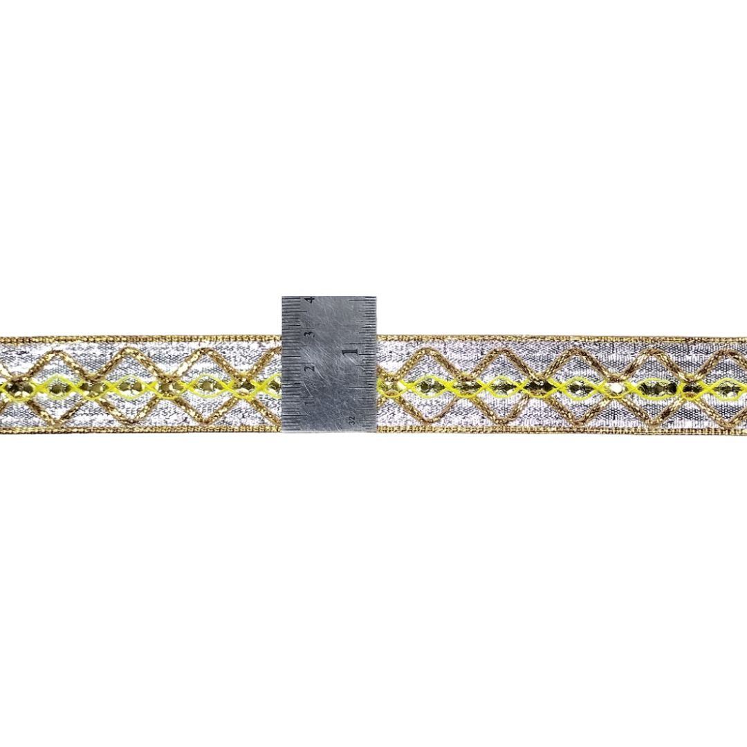 Decorative ribbon with a ruler for scale on a white background